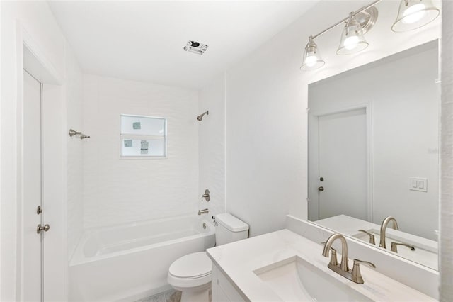 full bathroom featuring vanity, toilet, and tiled shower / bath