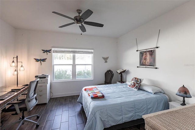 bedroom featuring ceiling fan and dark hardwood / wood-style flooring