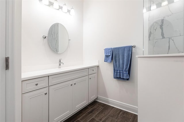 bathroom with wood-type flooring and vanity