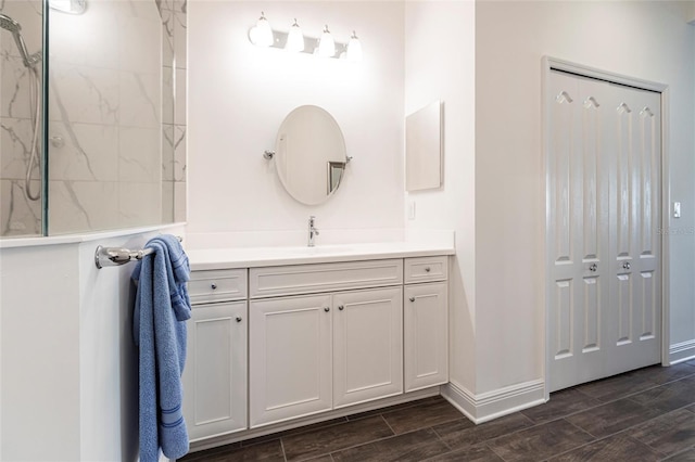 bathroom featuring vanity and wood-type flooring