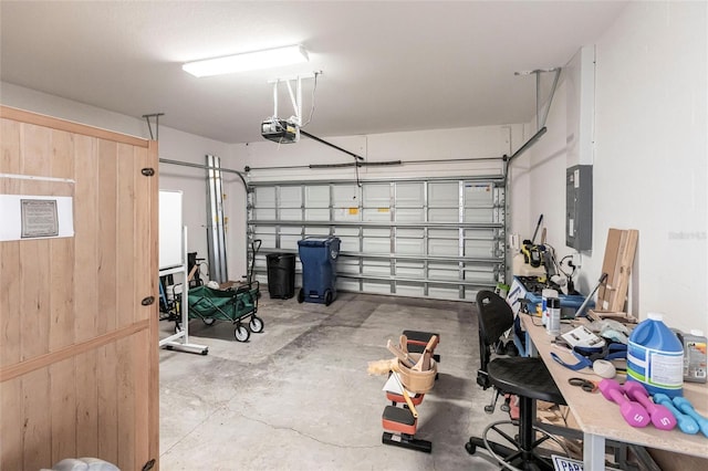 garage featuring a garage door opener and electric panel