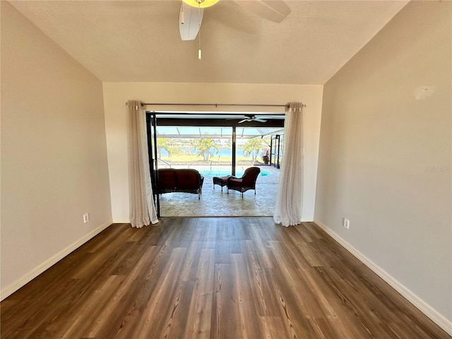 spare room featuring dark hardwood / wood-style floors