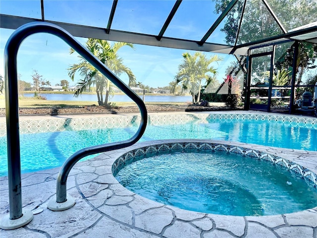 view of swimming pool with a water view and glass enclosure