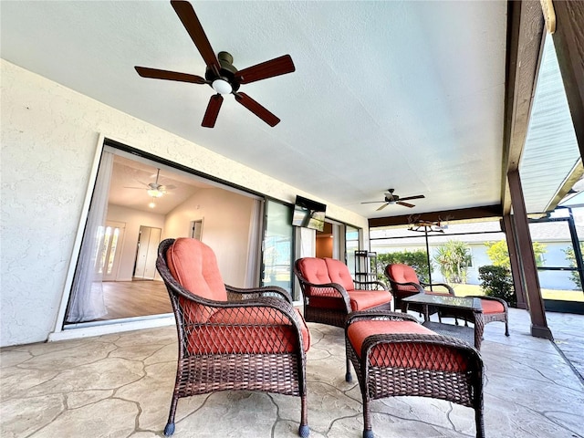 sunroom featuring vaulted ceiling