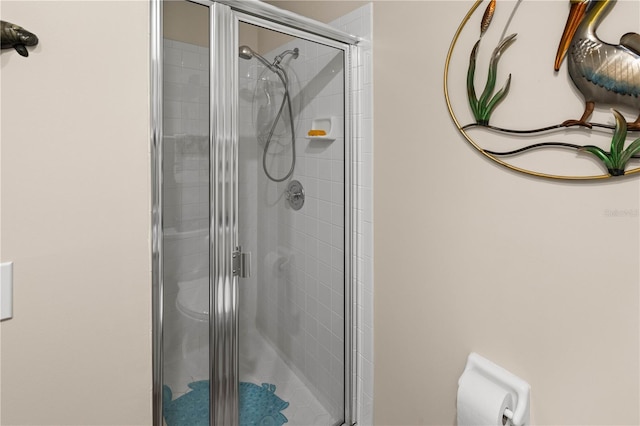 bathroom with an enclosed shower