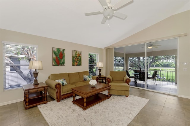 living room with tile patterned floors, ceiling fan, and lofted ceiling