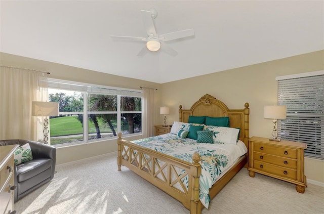 bedroom featuring ceiling fan and light colored carpet