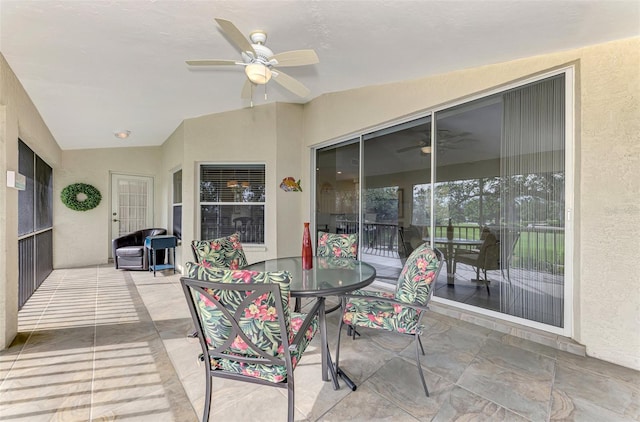 view of patio / terrace featuring ceiling fan