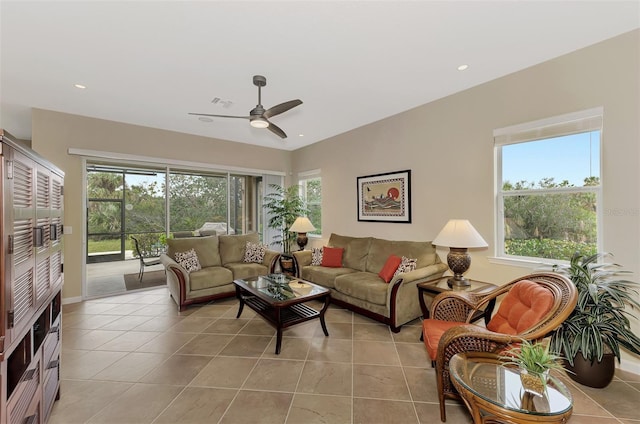 tiled living room with ceiling fan