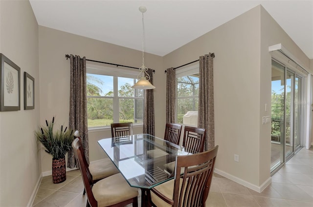 dining space with light tile patterned floors