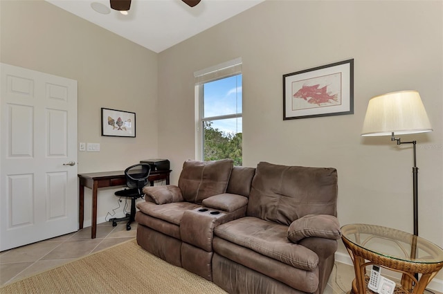 tiled living room with ceiling fan