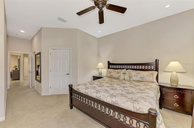 bedroom with ceiling fan and light colored carpet