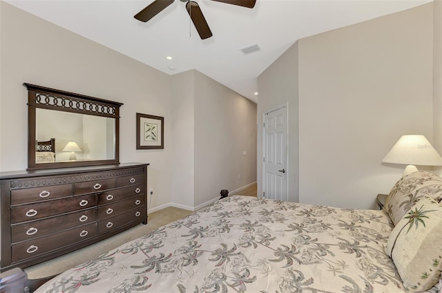 bedroom with light carpet and ceiling fan