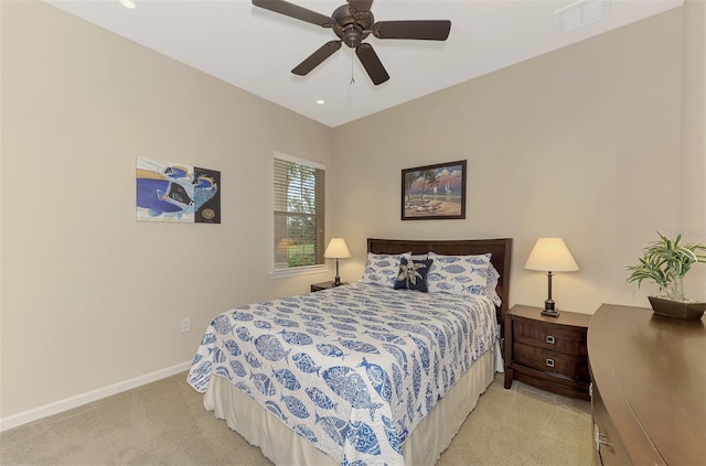 carpeted bedroom featuring ceiling fan