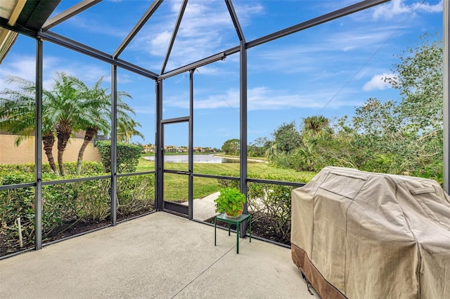 sunroom with a water view