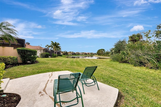 view of patio / terrace with a water view