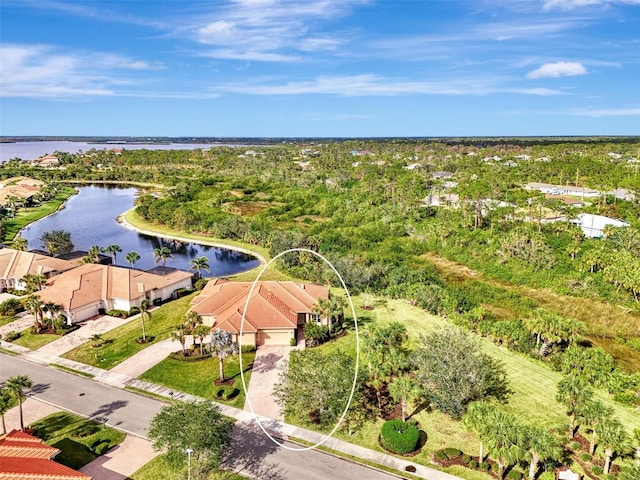 birds eye view of property featuring a water view