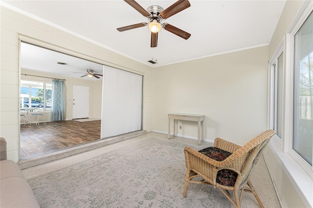 unfurnished room with visible vents, crown molding, and baseboards