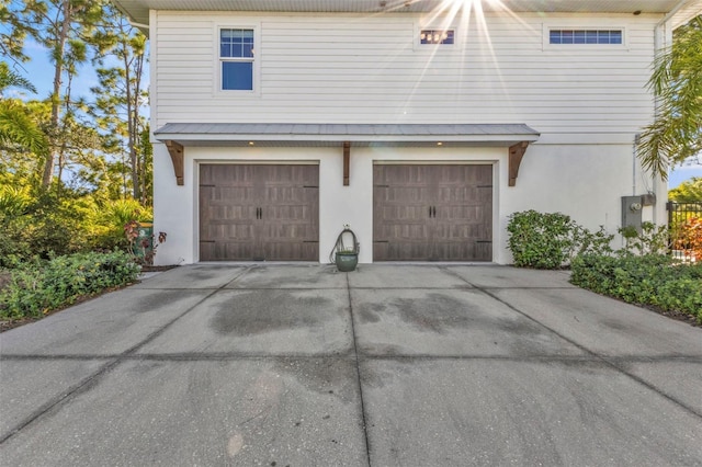 garage with driveway