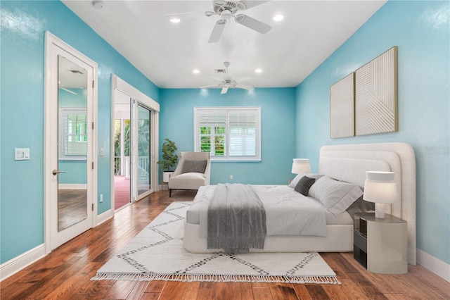 bedroom featuring ceiling fan, access to exterior, and hardwood / wood-style floors