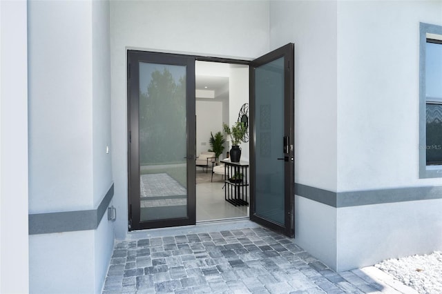 6192 Kambach St, Port Charlotte, FL 33981 - view of exterior entry featuring stucco siding