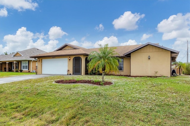 ranch-style home featuring a garage and a front yard