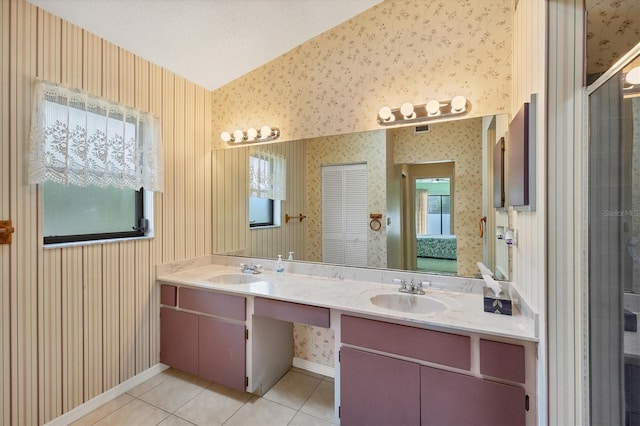 bathroom featuring tile patterned flooring and vanity