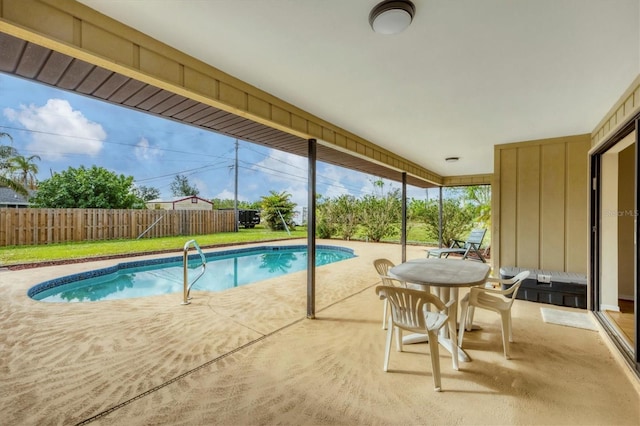 view of swimming pool featuring a patio