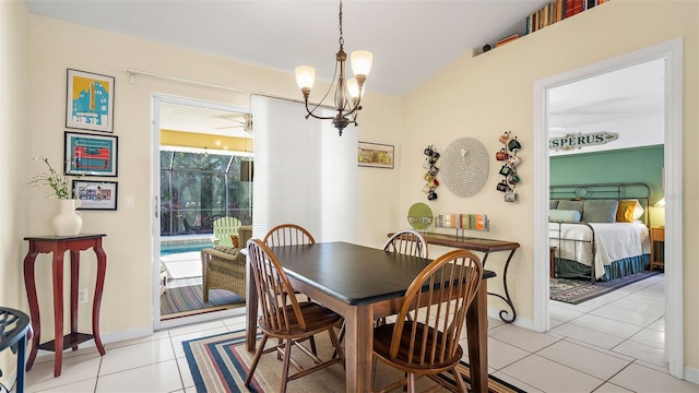 tiled dining area with a chandelier