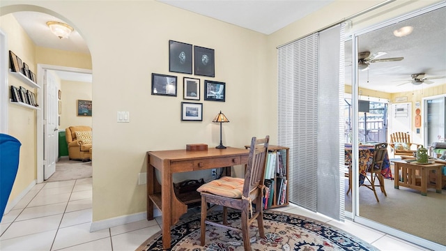 office featuring ceiling fan and light tile patterned flooring