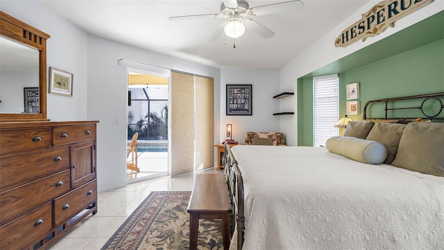 tiled bedroom featuring ceiling fan, access to exterior, and multiple windows