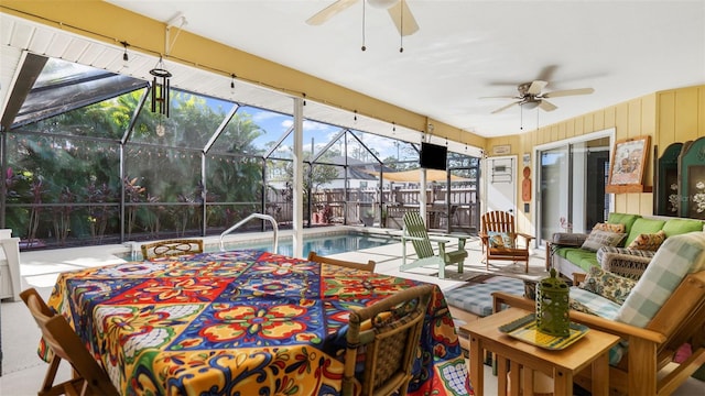 interior space with outdoor lounge area, ceiling fan, and a lanai