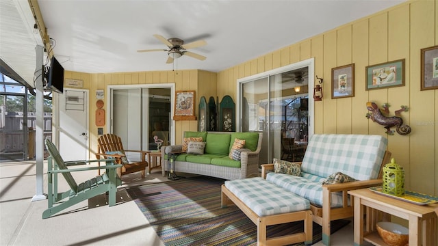 sunroom / solarium with ceiling fan