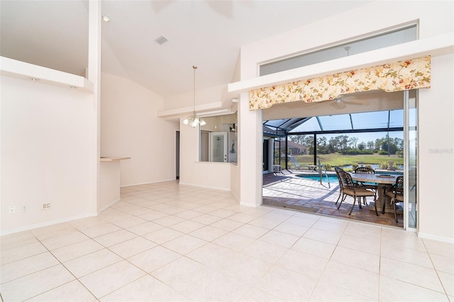 tiled dining space featuring high vaulted ceiling and ceiling fan