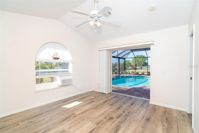 interior space featuring light hardwood / wood-style flooring, plenty of natural light, lofted ceiling, and ceiling fan