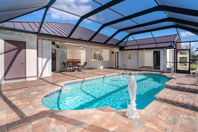 view of pool featuring a patio area and a lanai