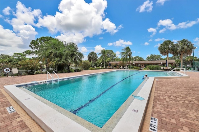 view of pool featuring a patio