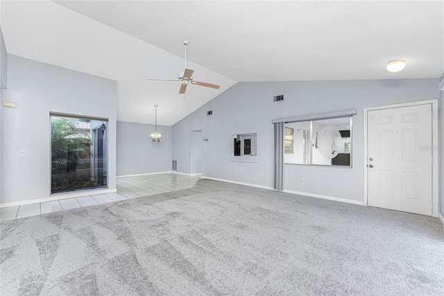 unfurnished living room with light colored carpet, ceiling fan, and lofted ceiling