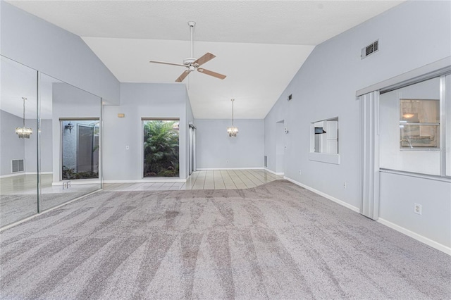 unfurnished living room featuring ceiling fan, light carpet, and high vaulted ceiling