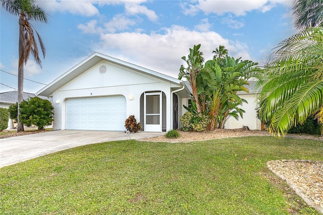 ranch-style house featuring a front lawn and a garage