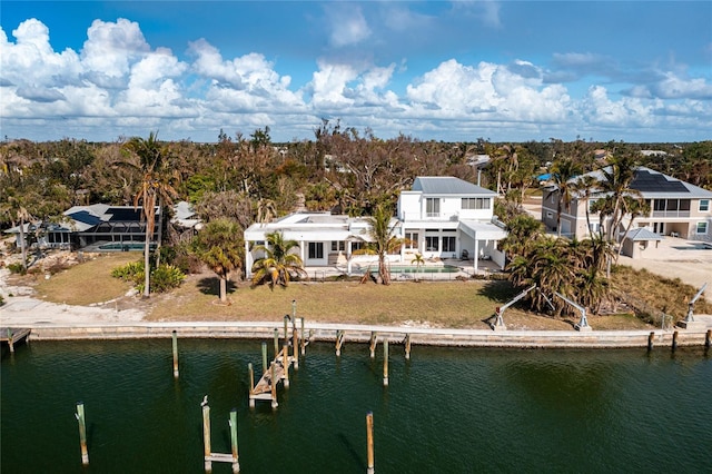 birds eye view of property featuring a water view