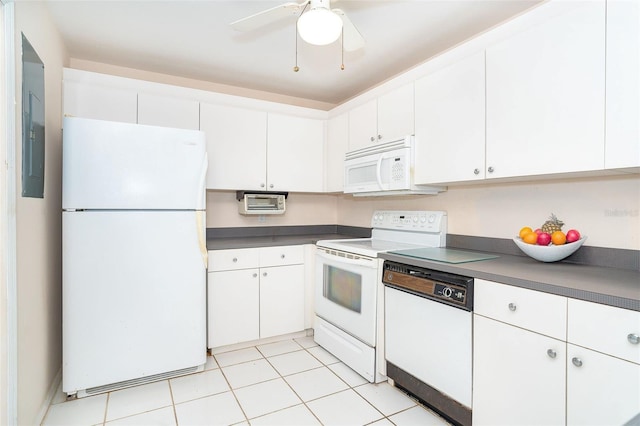 kitchen with white cabinetry, light tile patterned floors, white appliances, and ceiling fan