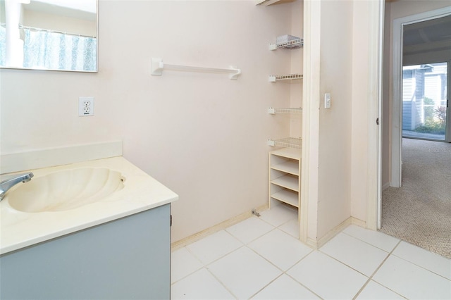 bathroom with vanity and tile patterned floors