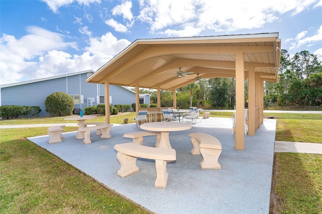 view of home's community featuring a patio area and a yard