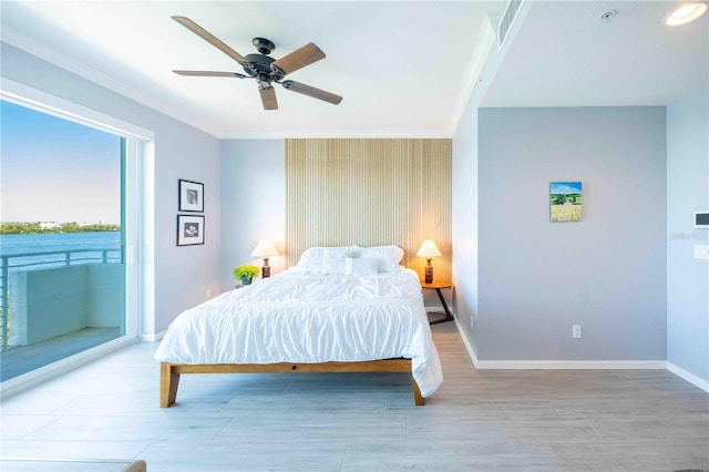 bedroom featuring access to outside, ceiling fan, and crown molding