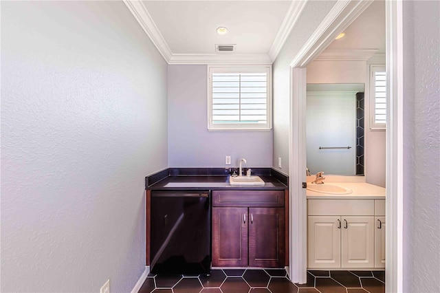 bathroom with tile patterned floors, vanity, crown molding, and a wealth of natural light