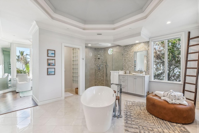 bathroom with separate shower and tub, crown molding, tile patterned floors, and vanity