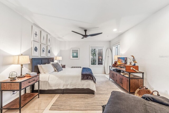 bedroom featuring ceiling fan and light tile patterned floors