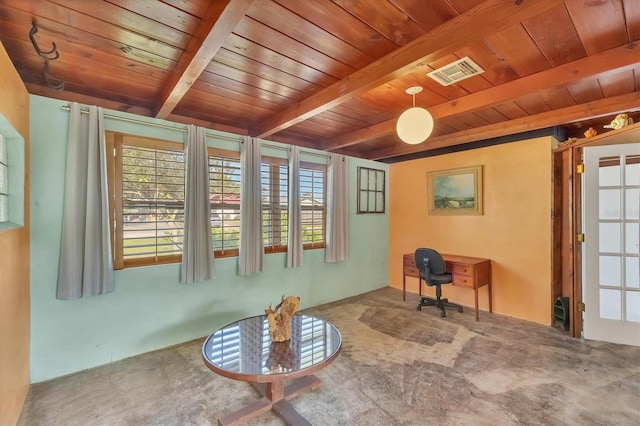 unfurnished room with beamed ceiling, carpet floors, and wood ceiling