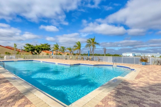 view of pool featuring a patio area